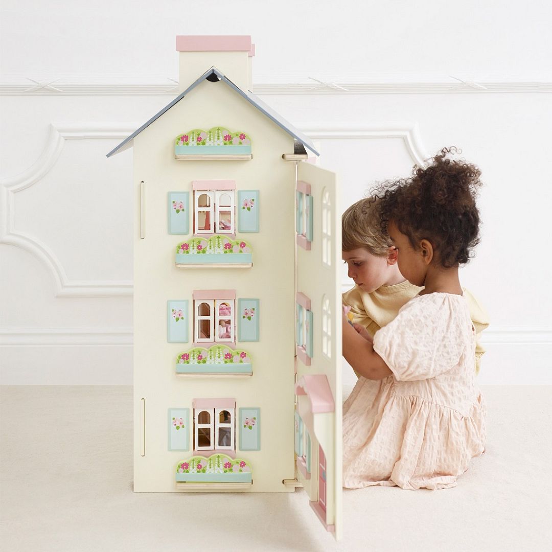 H150-cherry-tree-hall-2021-boy-girl-playing-with-dolls-house-door-open.jpg